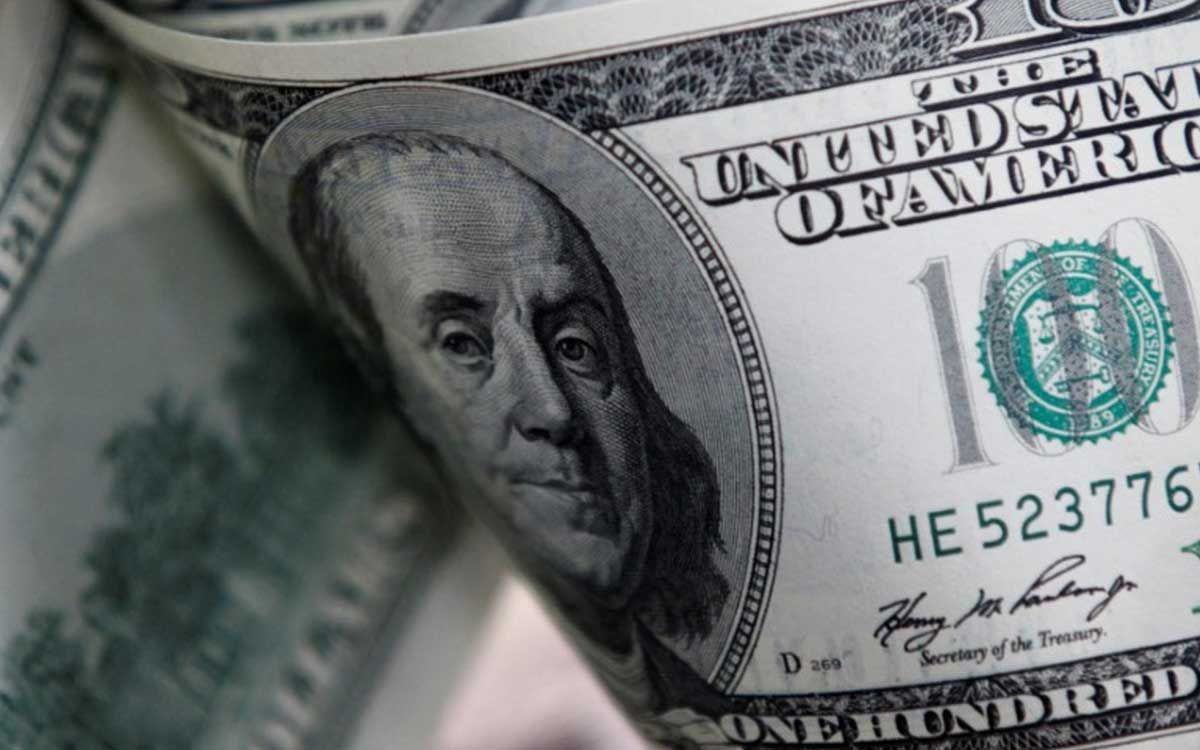 Dólar oscila perto da estabilidade ajustando-se às decisões de juros nos EUA e no Brasil